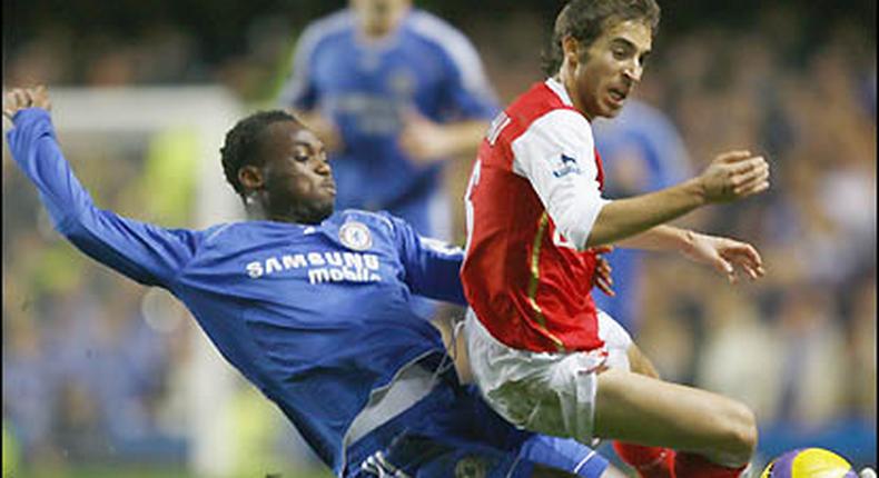 Michael Essien involved in a tackle