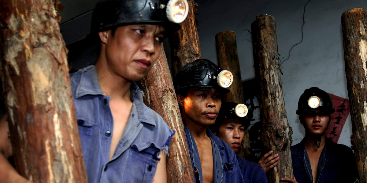 Miners prepare to carry out rescue work at the flooded Nadu mine in Tiandong county, Guangxi Zhuang autonomous region July 23, 2008.