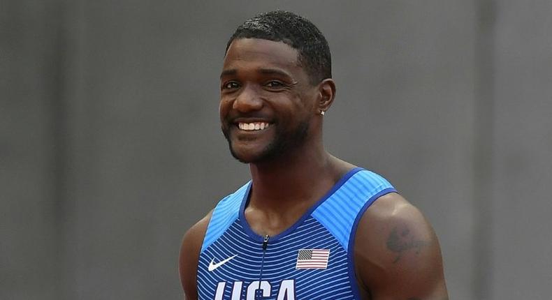 US athlete Justin Gatlin smiles before his heat of the men's 4x100m relay athletics event at the 2017 IAAF World Championships at the London Stadium in London on August 12, 2017