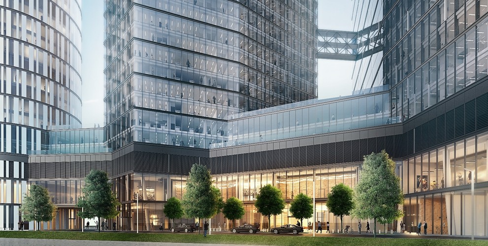 Dostęp do budynku będzie możliwy dzięki smartfonom, a parking zostanie wyposażony w system rozpoznawania samochodów, myjnię i stacje do ładowania pojazdów elektrycznych. Kompleks będzie zasilany z trzech niezależnych źródeł energii, a najemcy będą mogli zainstalować w nim również swoje własne generatory. <br><br>The Warsaw HUB - wizualizacja. Źródło: Ghelamco Poland