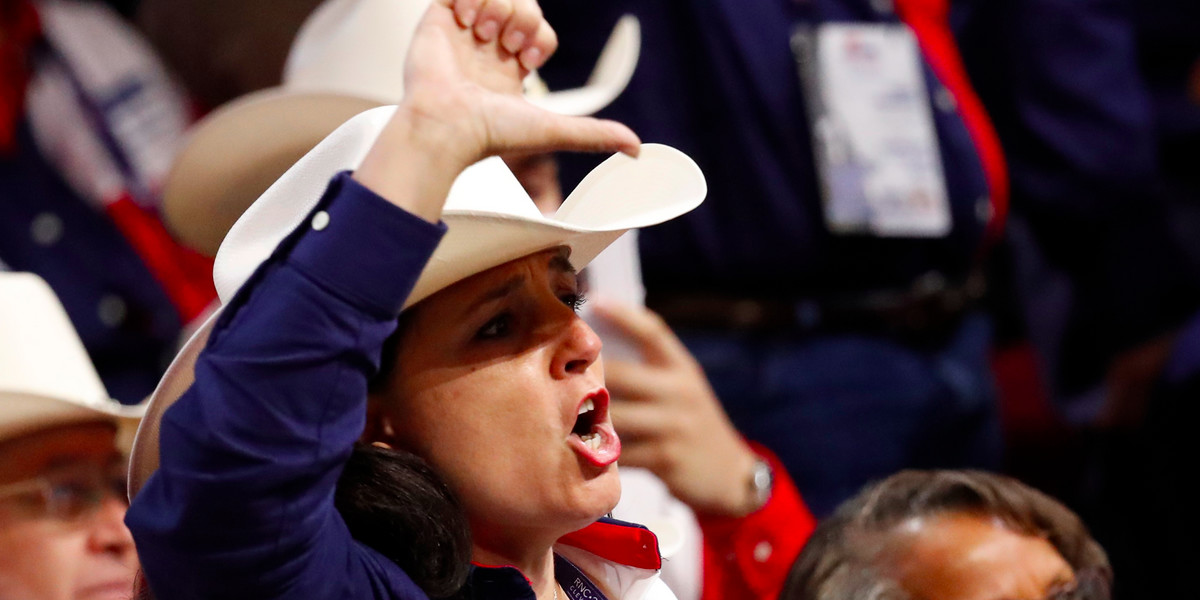 A Texas delegate yells after the temporary chairman of the Republican National Convention announced that the convention would not hold a roll-call vote on the Rules Committee's report and rules changes and rejected the efforts of anti-Trump forces.