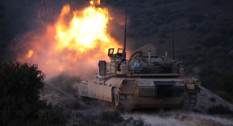 A M1 Abrams Main Battle Tank in 1st Battalion, 18th Infantry Regiment, 1st Infantry Division fires at a prop target during a live fire exercise on Feb. 17, 2023 in Petrochori Training Area, Greece.US Army photo by Pfc. Matthew Wantroba