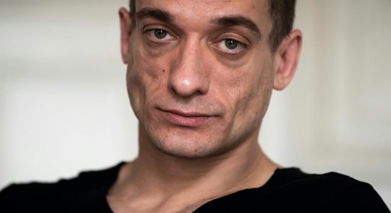 Russian artist Pyotr Pavlensky poses during a press interview with AFP at his lawyer's office in Paris on February 14, 2020.Pavlensky was placed in custody on February 15, 2020 as part of an investigation for violence on December 31, 2019.
Emmanuel Macron's candidate for Paris mayor, Benjamin Griveaux, withdrew from the race over a leaked sex video on February 13, in a blow for the French president's party ahead of March local elections.   Griveaux said he opted for retreat to protect his family after a website published video excerpts of a man masturbating, accompanied by screengrabs of racy text messages, which it said came from the former government spokesman. On February 14, the Russian performance artist Pyotr Pavlensky confirmed, in an AFP interview in the office of his lawyer Juan Branco, that he was responsible for publishing the video online.