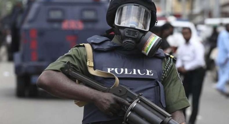 Masked Nigerian Police officer