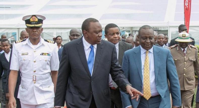 President Uhuru Kenyatta with Finance CS Henry Rotich