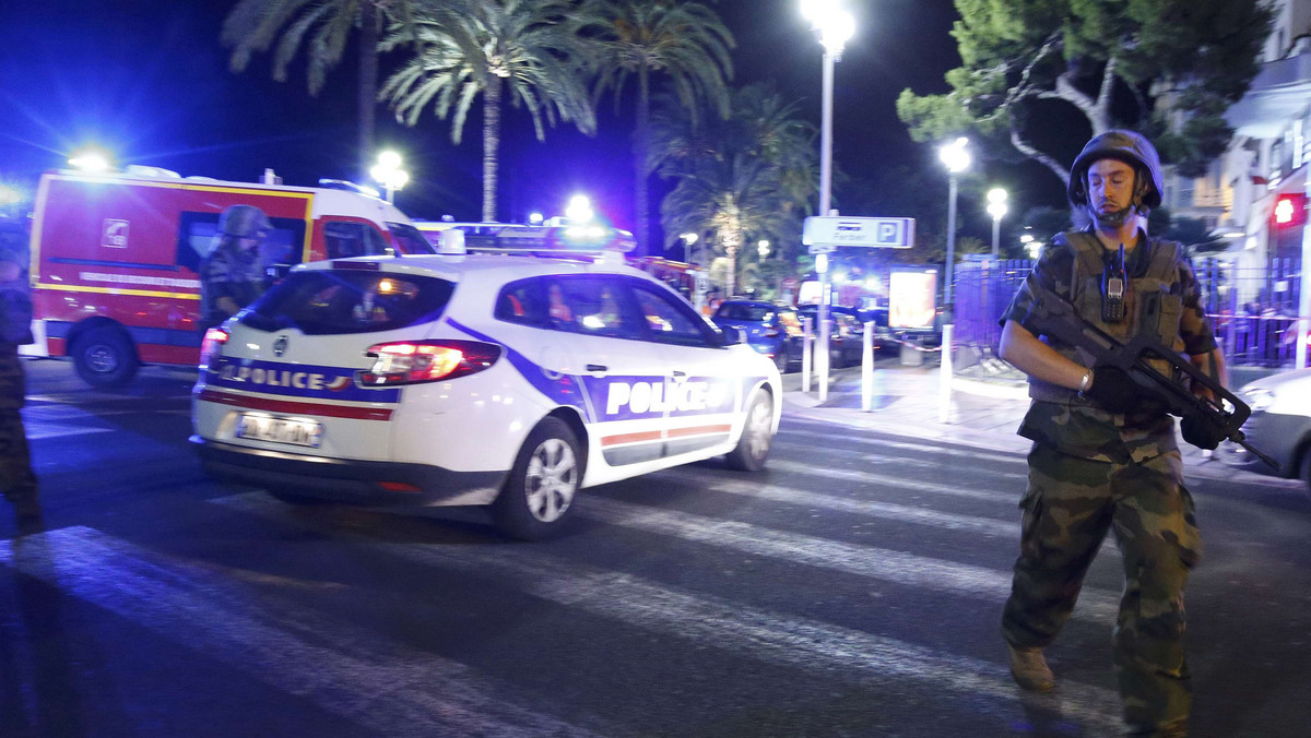 French soldiers and police secure the area after at least 30 people were killed in Nice when a truck ran into a crowd celebrating the Bastille Day national holiday