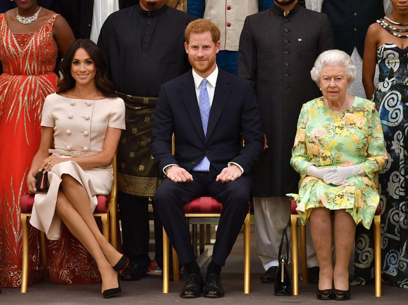 Britain's Prince Harry and Meghan, the Duchess of Sussex attend reception following the final Queen'