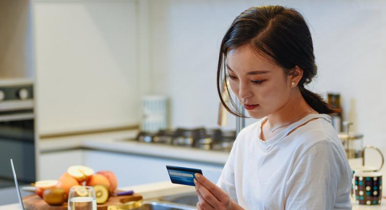 woman using credit card