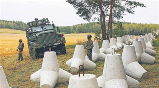 Co dokładnie rząd obiecał Brukseli ws. paktu migracyjnego