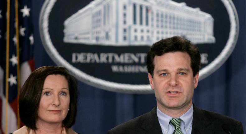 Christopher Wray with Mary Beth Buchanan, then the director of the Executive Office for US Attorneys, at a 2005 press conference in Washington.