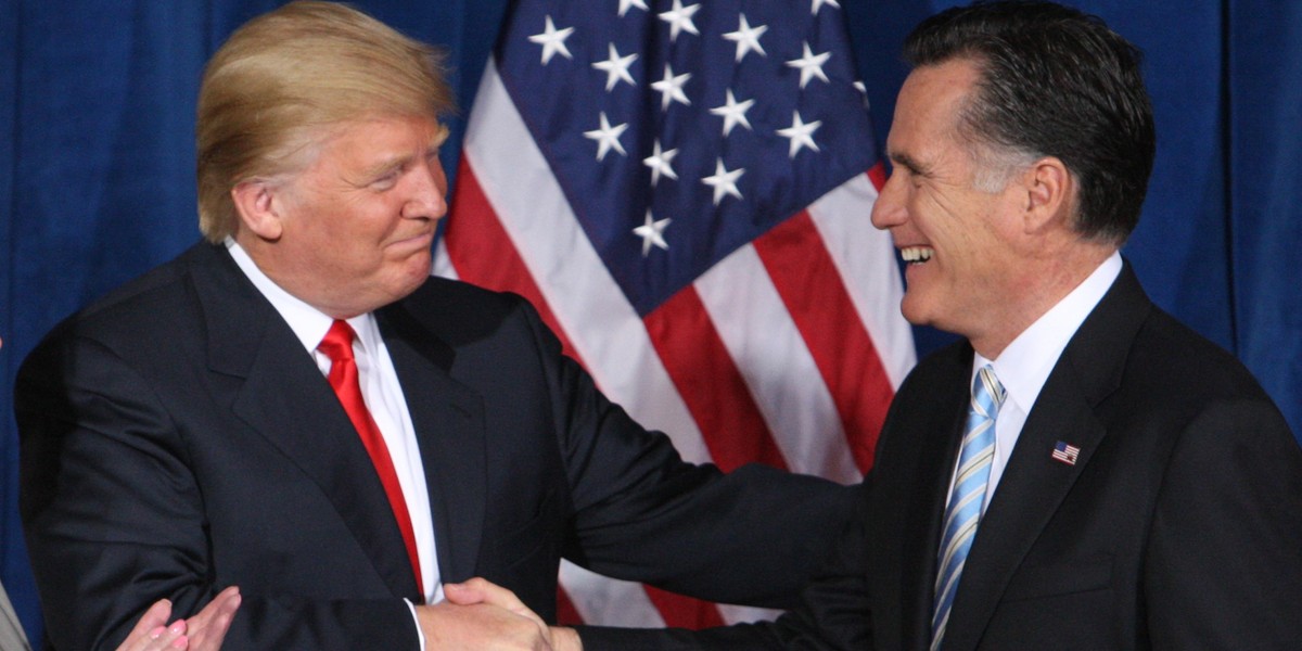 Donald Trump greets Mitt Romney after endorsing Romney's candidacy for president in 2012.