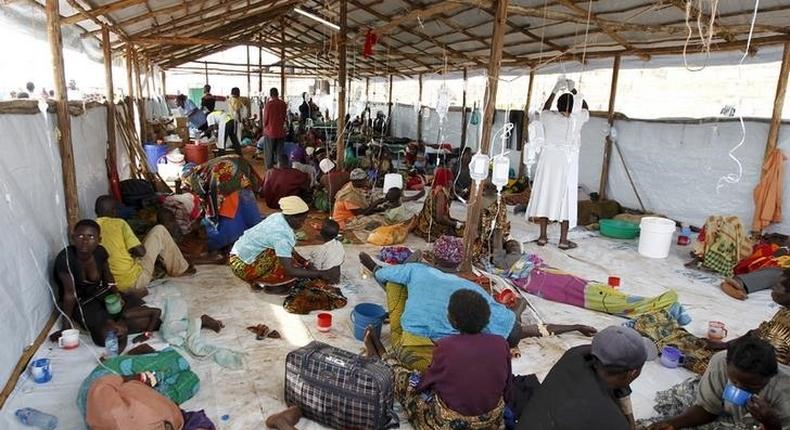 A general view shows Burundian refugees receiving treatment at a makeshift clinic at the Lake Tanganyika stadium in Kigoma western Tanzania, May 19, 2015. REUTERS/Thomas Mukoya