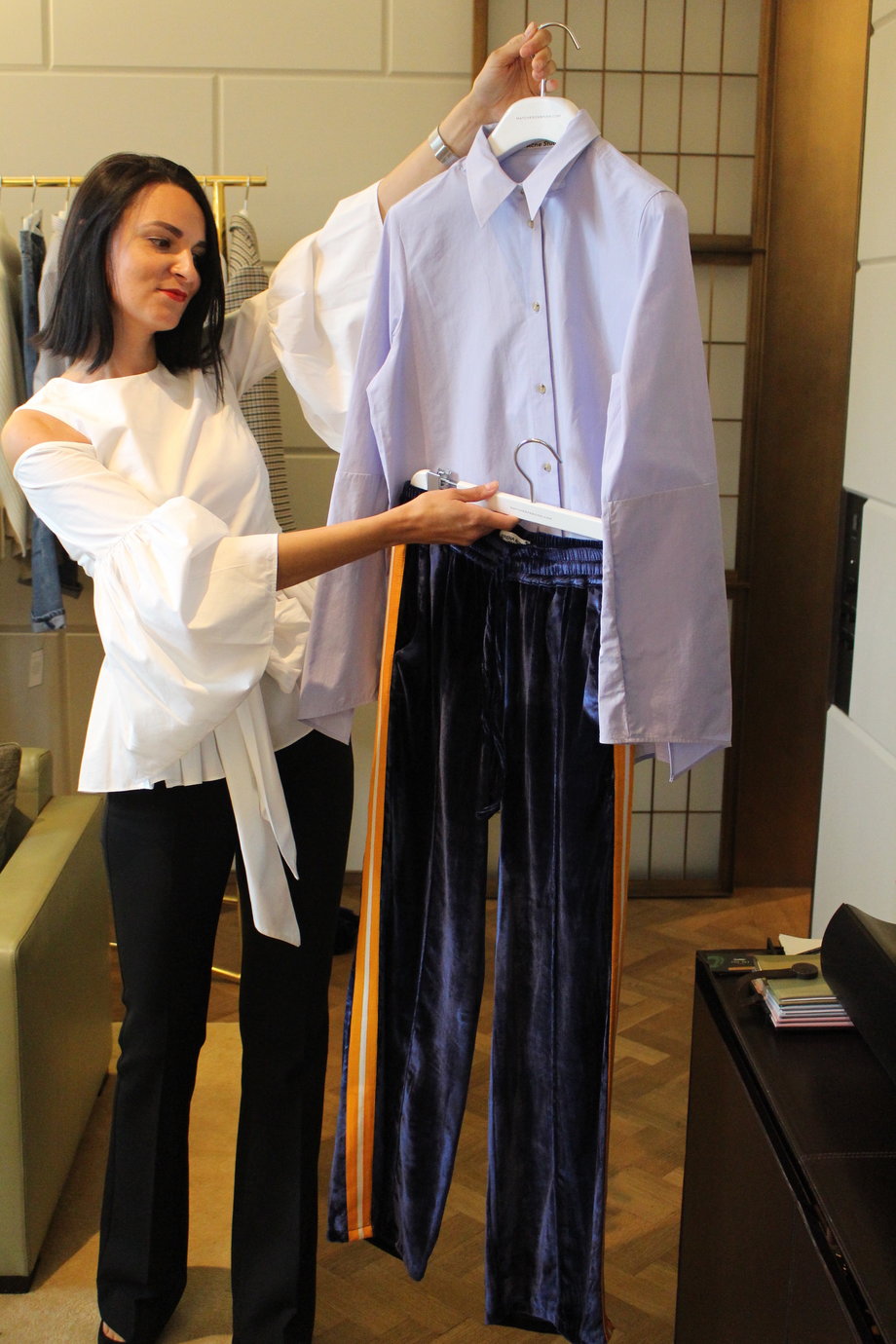 Oversized cotton shirt from Acne Studios and contrast-striped wide-leg velvet trousers by Serena Bute (£350).