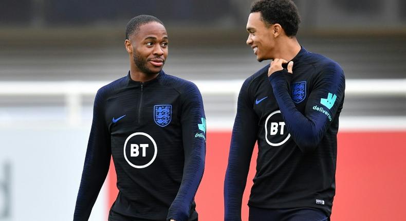 Friends turned foes: England teammates Raheem Sterling (left) and Trent Alexander-Arnold (right) will face off on Sunday