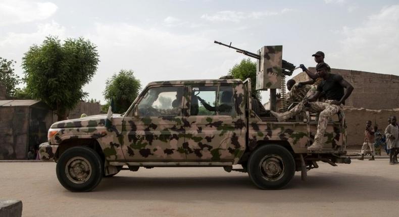 A Nigerian army vehicle patrols in the town of Banki in northeastern Nigeria on April 26, 2017 (AFP)