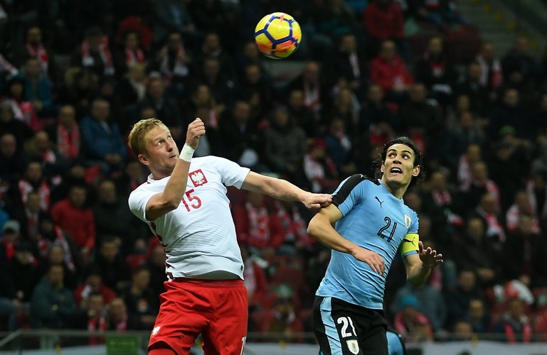 Kamil Glik (L) i Edinson Cavani