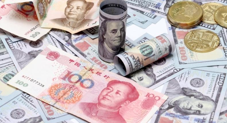 yuan to dollar (ShanghaiDaily)