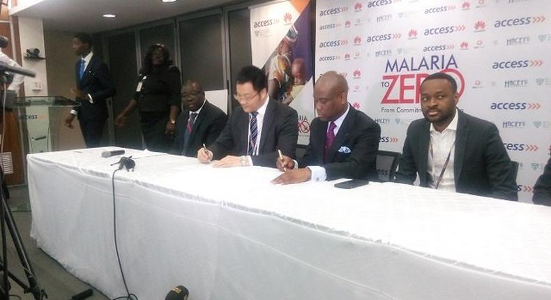 Herbert Wigwe and the Huawei CEO signing the partnership