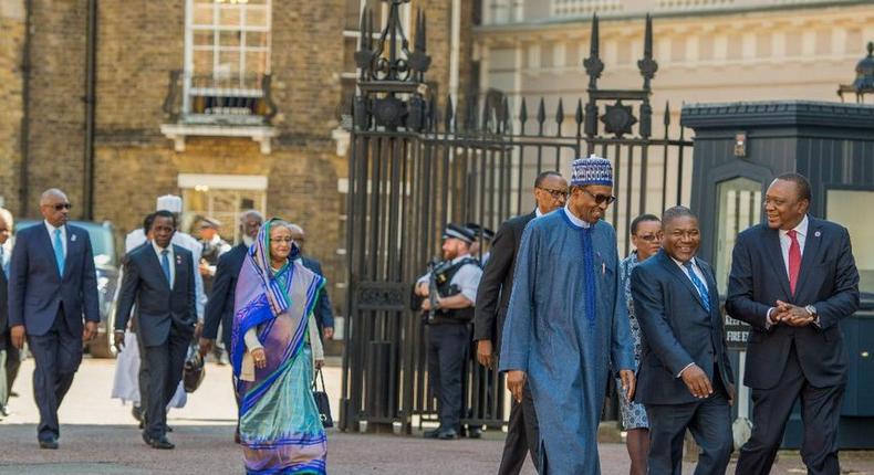 File Photo: President Uhuru Kenyatta with President Muhammadu Buhari of Nigeria and President Filipe Nyusi of Mozambique arriving at St. James's Palace for the official welcome of Commonwealth Heads of Government Meeting in London. PSCU