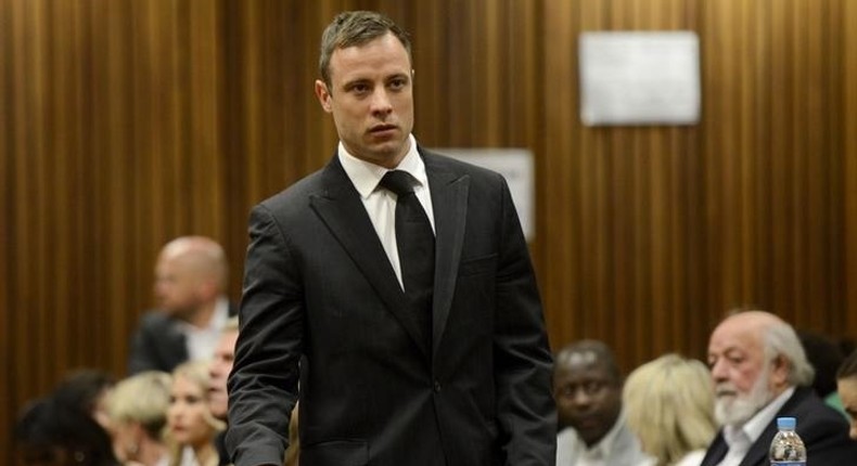 South African Olympic and Paralympic track star Oscar Pistorius attends his sentencing at the North Gauteng High Court in Pretoria October 21, 2014. REUTERS/Herman Verwey/Pool