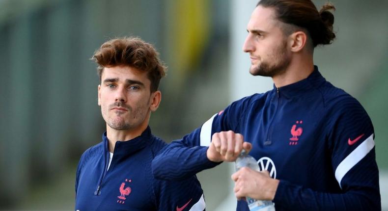 Antoine Griezmann (L) is set to make his 100th France appearance while Adrien Rabiot is out of the Nations League final following a positive Covid-19 test Creator: FRANCK FIFE