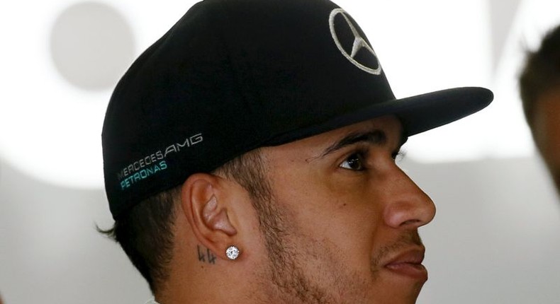 Mercedes Formula One driver Lewis Hamilton of Britain looks on during the second free practice of the Spanish Grand Prix at the Circuit de Barcelona-Catalunya racetrack in Montmelo, near Barcelona, Spain, May 8, 2015. REUTERS/Albert Gea