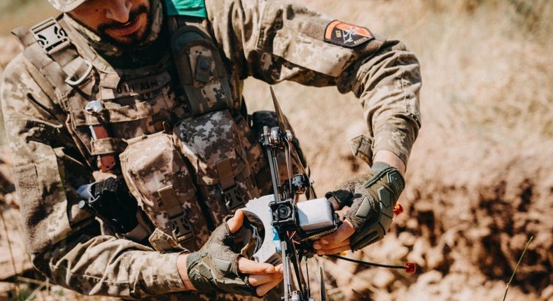 A Ukrainian drone operator from the 24th Separate Mechanized Brigade holds a drone during the testing of new military equipment including FPV drones on the training area amid Russia-Ukraine war in Donetsk Oblast, Ukraine on August 03, 2023.Wojciech Grzedzinski/Anadolu Agency via Getty Images