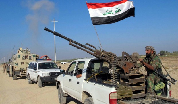 Pripadnici grupe Kataib Hezbolah u Džurf al Saharu na jugu Iraka 27. oktobra 2014.