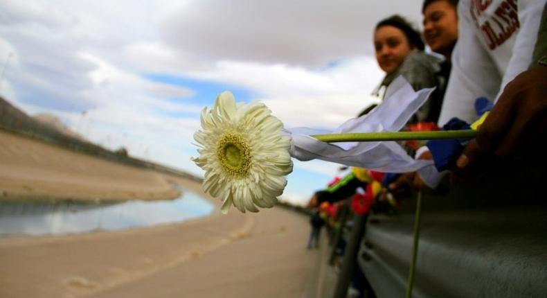 People from Ciudad Juarez protest against the politics of US President Donald Trump along the Rio Bravo, at the border between Ciudad Juarez and El Paso, Texas in February 2017