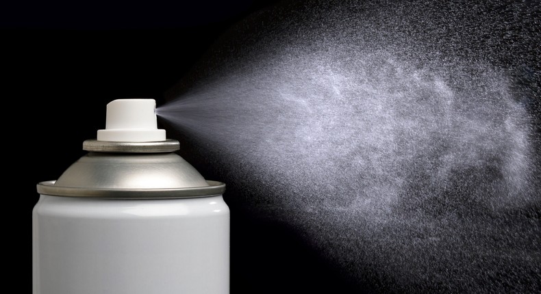 An aerosol can being sprayed.VICTOR de SCHWANBERG/SCIENCE PHOTO LIBRARY/Getty Images