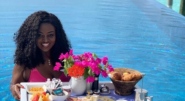 Ghanaian actress, Jackie Appiah enjoys her breakfast  in the Pool