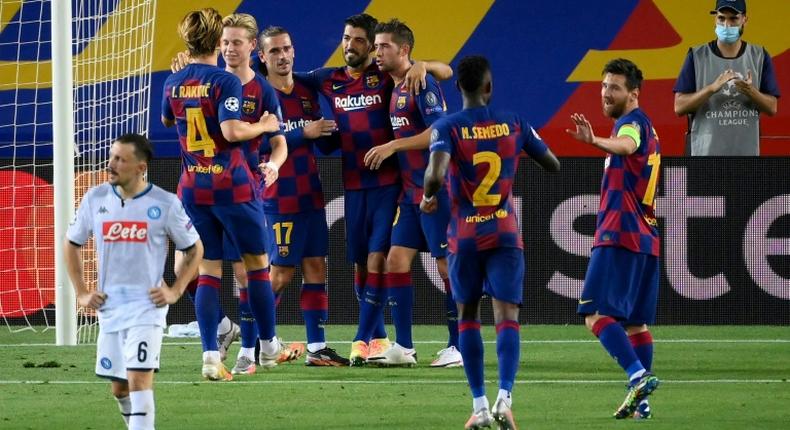 Barcelona beat Napoli to reach the Champions League quarter-finals