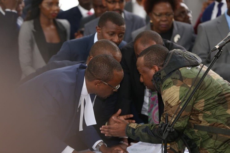 Nairobi Governor Mike Sonko with his lawyers in court