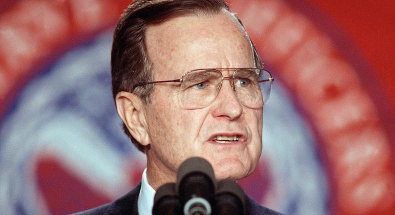 U.S. President George H. Bush gestures during a speech to the Reserve Officers Association in Washington, Wednesday evening, Jan. 23, 1991.