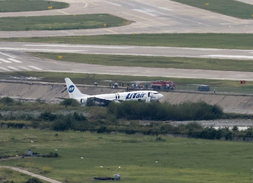 Utair Boeing 737-800 passenger plane is seen off an airport runway in Sochi