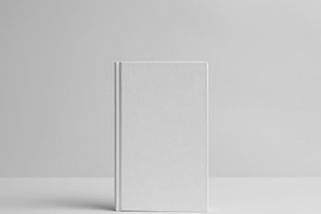 Hardcover Canvas Book Mock-Up- Front. Wall Background