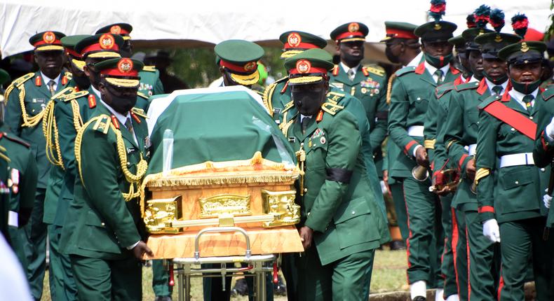 Army Officers carrying the casket bearing the remains of the late Chief of Army Staff, Lt.-Gen Ibrahim Attahiru who died in the ill-fated NAF Aircraft that crashed in Kaduna during the burial at the Military Cemetery in Abuja on Saturday (Tope Alabi)