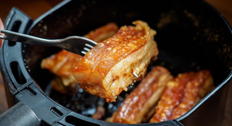 Cooking food in an air fryer can help you achieve crispy, delicious results.Shutterstock