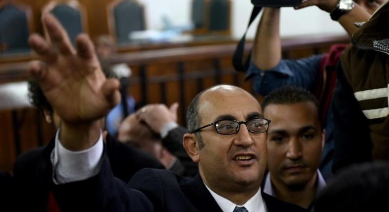 Egyptian lawyer Khaled Ali (C), seen in 2016, was the main lawyer to bring a case against the government after it agreed to hand over two Red Sea islands to Saudi Arabia in April last year