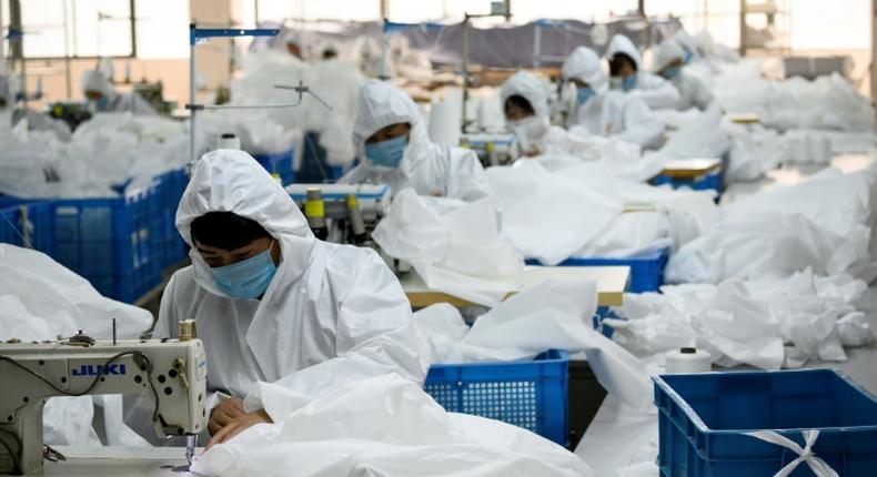 Ugly Duck Industry in Wenzhou, eastern China, has switched production from winter coats to hazmat suits