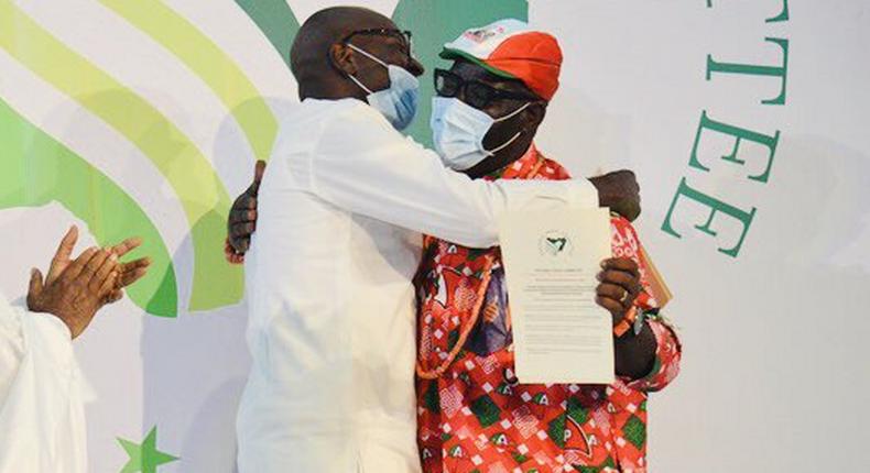 Osagie Ize-Iyamu and Godwin Obaseki hug after signing a peace pact ahead of the September 19 Edo governorship election [INEC]