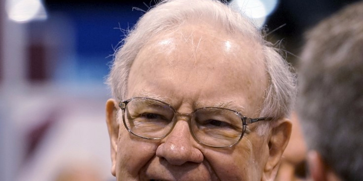 Berkshire Hathaway CEO Warren Buffett talks to reporters prior to the Berkshire annual meeting in Omaha