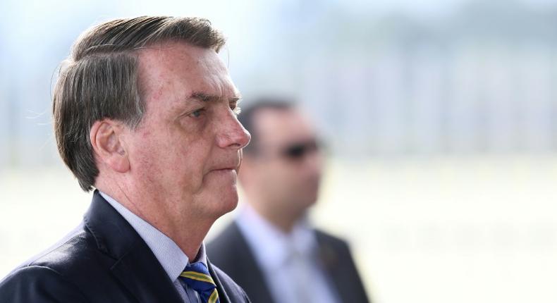 Brazilian President Jair Bolsonaro's (pictured May 6, 2020) criticism of stay-at-home measures to fight the virus has put him at odds with state and local authorities across Brazil, not to mention his own former health minister
