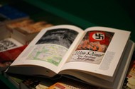 A copy of the book 'Hitler, Mein Kampf. A Critical Edition' lies on a display table in a bookshop in