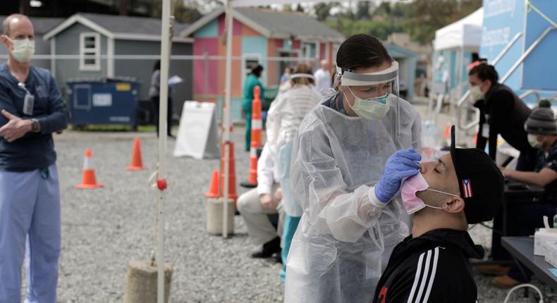 coronavirus test testing facility swab seattle low income housing