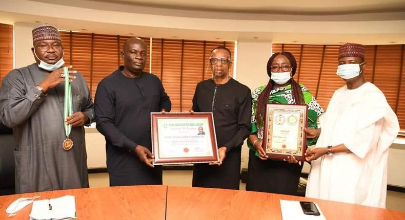 L- R: Bashir Bello, Head, Legislative and Government Relations, Nigerian Communications Commission (NCC); Hon. Uchechukwu Chukwuma, Director General, National Association of State Assembly Legislators (NASAL); Dr. Ikechukwu Adinde, Director, Public Affairs, NCC; Truddy Tony-Awusaku, Principal Manager, Public Affairs, NCC; Hon. Usman Ali, Co-ordinator, North-West Zone, NASAL, during the  presentation of National Award of Excellence to Prof. Umar Garba Danbatta, Executive Vice Chairman/CEO, NCC by NASAL at the Commission's Headquarters Abuja. Adinde received the award on behalf of the EVC.