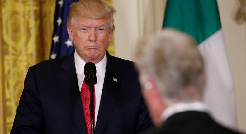 U.S. President Donald Trump (L) listens to a question during a joint news conference with Italian Prime Minister Paolo Gentiloni at the White House in Washington, U.S., April 20, 2017.