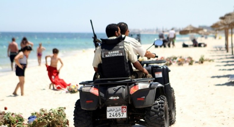 Tunisian security forces patrol a beach in Sousse, south of Tunisia's capital Tunis, on July 1, 2015, following the previous week's massacre at the resort there by a jihadist gunman