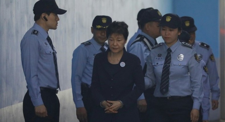 Handcuffed and on her way to court, the fall from grace for ousted South Korean president Park Geun-hye has been steep