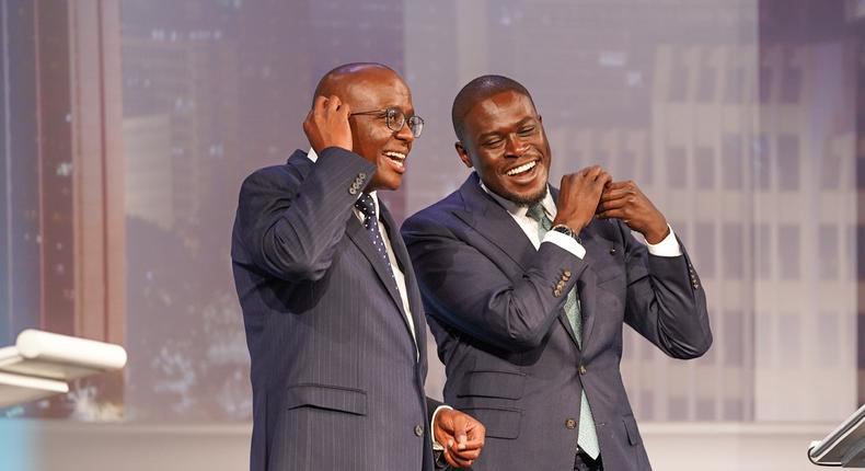 Nairobi gubernatorial candidates Polycarp Igathe of Jubilee party (L) and Johnson Sakaja of UDA party (R) react after taking part in the Nairobi Gubernatorial Debate held at the Catholic University of Eastern Africa (CUEA) on July 11, 2022.